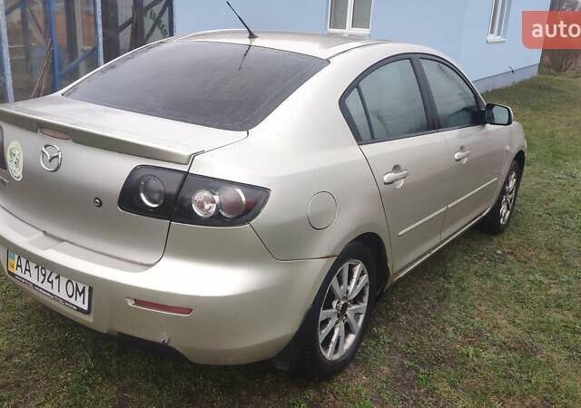 Серый Мазда 3, объемом двигателя 1.6 л и пробегом 241 тыс. км за 3300 $, фото 3 на Automoto.ua