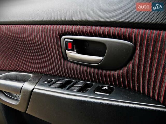 Сірий Мазда 3, об'ємом двигуна 2 л та пробігом 178 тис. км за 5200 $, фото 6 на Automoto.ua