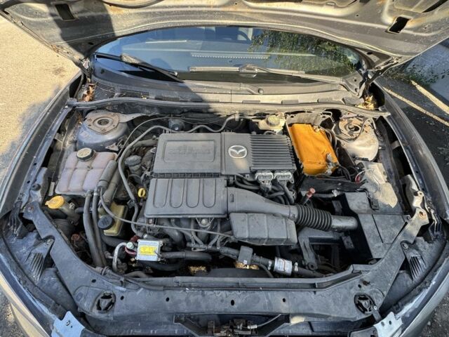 Серый Мазда 3, объемом двигателя 1.6 л и пробегом 270 тыс. км за 4500 $, фото 4 на Automoto.ua