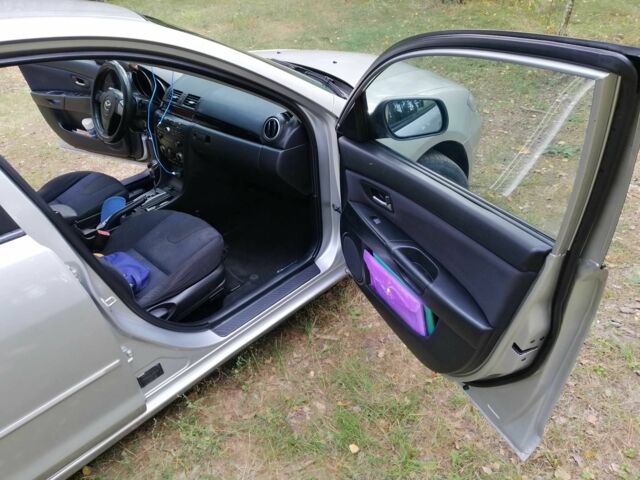 Сірий Мазда 3, об'ємом двигуна 1.6 л та пробігом 187 тис. км за 4700 $, фото 12 на Automoto.ua
