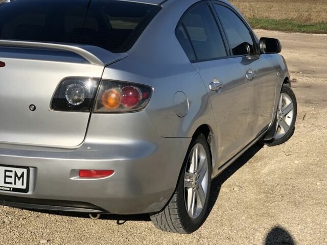 Серый Мазда 3, объемом двигателя 1.6 л и пробегом 274 тыс. км за 4400 $, фото 2 на Automoto.ua