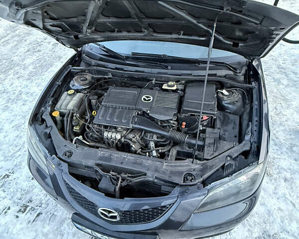 Серый Мазда 3, объемом двигателя 1.6 л и пробегом 279 тыс. км за 5000 $, фото 3 на Automoto.ua