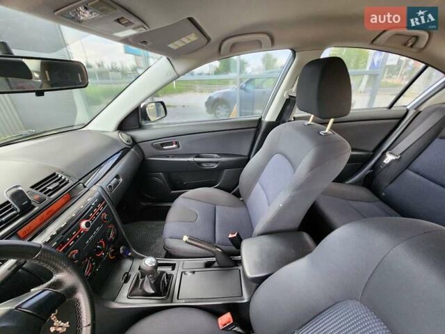 Серый Мазда 3, объемом двигателя 1.6 л и пробегом 175 тыс. км за 4950 $, фото 51 на Automoto.ua