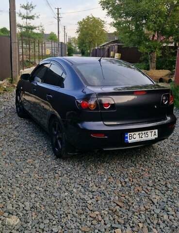 Серый Мазда 3, объемом двигателя 1.6 л и пробегом 260 тыс. км за 5300 $, фото 2 на Automoto.ua