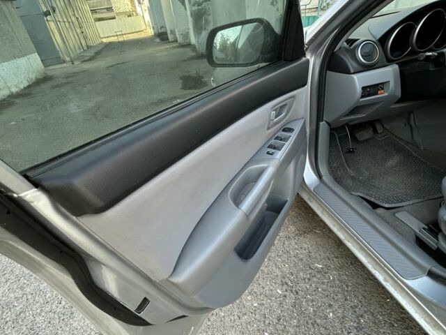 Сірий Мазда 3, об'ємом двигуна 1.6 л та пробігом 200 тис. км за 1900 $, фото 6 на Automoto.ua