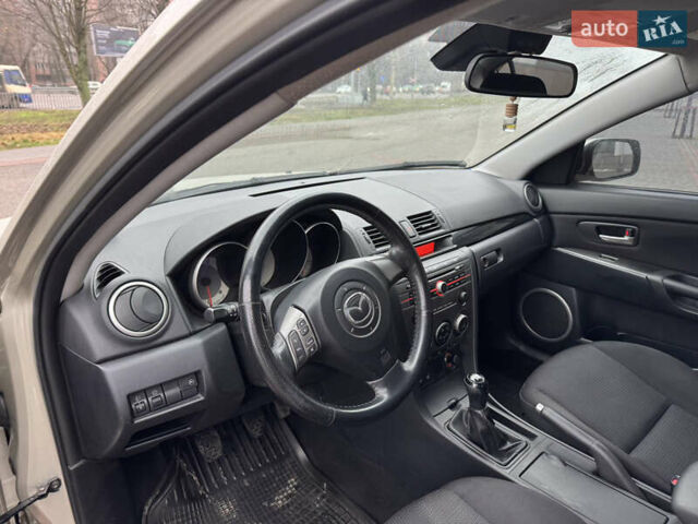 Серый Мазда 3, объемом двигателя 1.6 л и пробегом 165 тыс. км за 5000 $, фото 10 на Automoto.ua