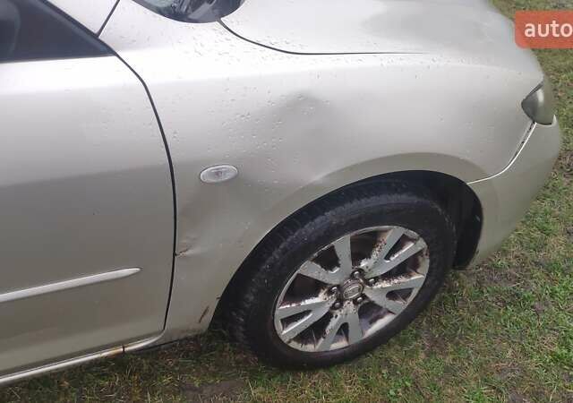 Серый Мазда 3, объемом двигателя 1.6 л и пробегом 241 тыс. км за 3300 $, фото 7 на Automoto.ua