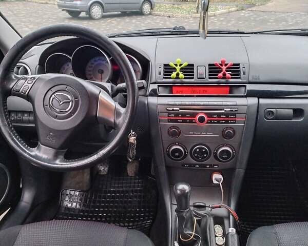 Серый Мазда 3, объемом двигателя 1.6 л и пробегом 250 тыс. км за 4750 $, фото 4 на Automoto.ua
