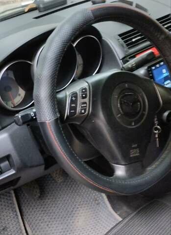 Сірий Мазда 3, об'ємом двигуна 1.6 л та пробігом 273 тис. км за 4500 $, фото 6 на Automoto.ua