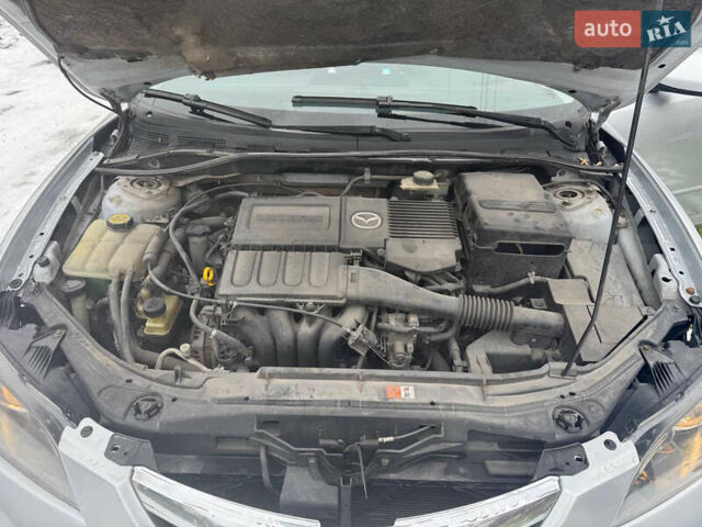 Сірий Мазда 3, об'ємом двигуна 1.6 л та пробігом 251 тис. км за 4100 $, фото 13 на Automoto.ua