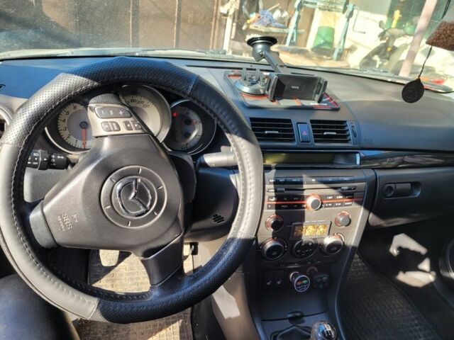 Сірий Мазда 3, об'ємом двигуна 1.6 л та пробігом 190 тис. км за 4700 $, фото 4 на Automoto.ua