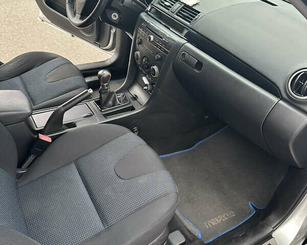 Серый Мазда 3, объемом двигателя 1.6 л и пробегом 127 тыс. км за 4900 $, фото 10 на Automoto.ua