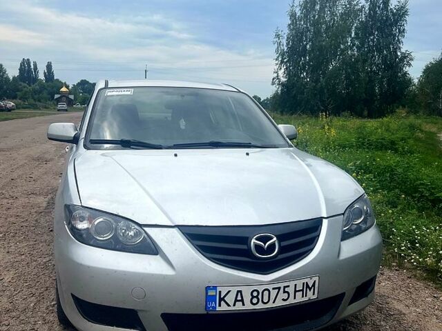 Серый Мазда 3, объемом двигателя 2 л и пробегом 213 тыс. км за 4200 $, фото 6 на Automoto.ua
