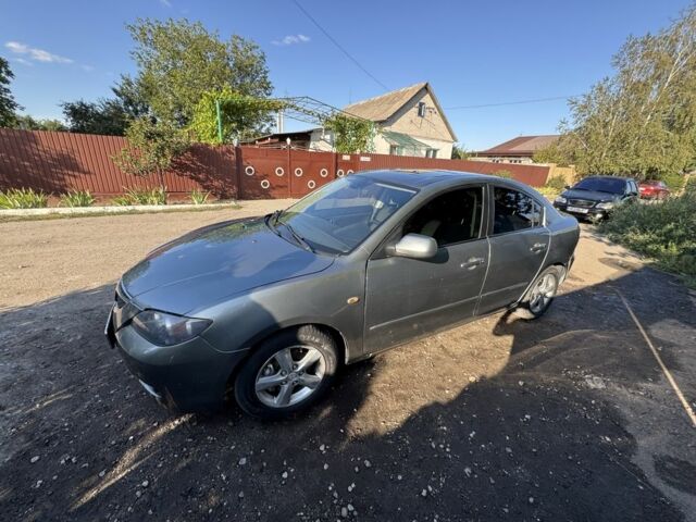 Серый Мазда 3, объемом двигателя 1.6 л и пробегом 270 тыс. км за 4500 $, фото 1 на Automoto.ua