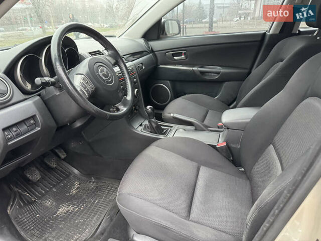 Серый Мазда 3, объемом двигателя 1.6 л и пробегом 165 тыс. км за 5000 $, фото 9 на Automoto.ua