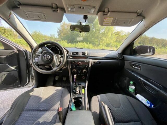 Серый Мазда 3, объемом двигателя 1.6 л и пробегом 274 тыс. км за 4400 $, фото 6 на Automoto.ua