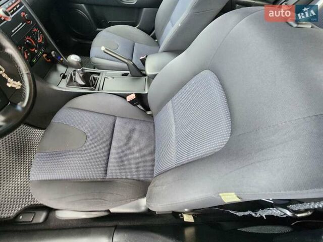 Серый Мазда 3, объемом двигателя 1.6 л и пробегом 175 тыс. км за 4950 $, фото 45 на Automoto.ua