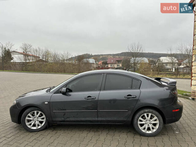Серый Мазда 3, объемом двигателя 1.6 л и пробегом 310 тыс. км за 4400 $, фото 6 на Automoto.ua