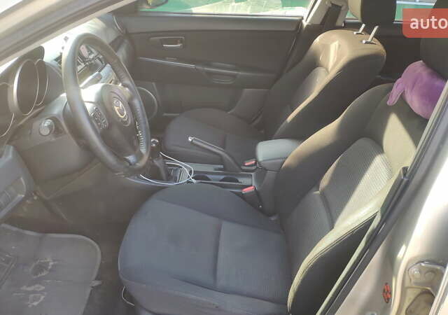 Серый Мазда 3, объемом двигателя 1.6 л и пробегом 241 тыс. км за 3300 $, фото 11 на Automoto.ua