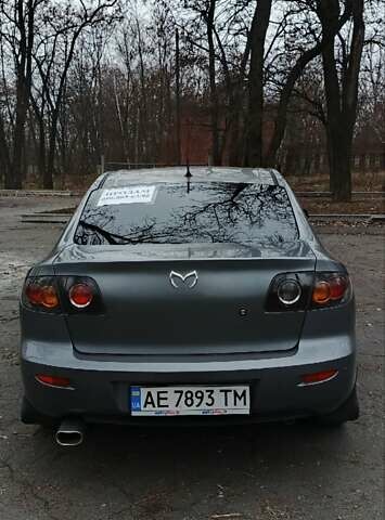 Серый Мазда 3, объемом двигателя 1.6 л и пробегом 301 тыс. км за 5400 $, фото 1 на Automoto.ua