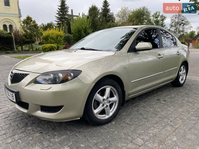 Серый Мазда 3, объемом двигателя 1.6 л и пробегом 260 тыс. км за 5100 $, фото 2 на Automoto.ua