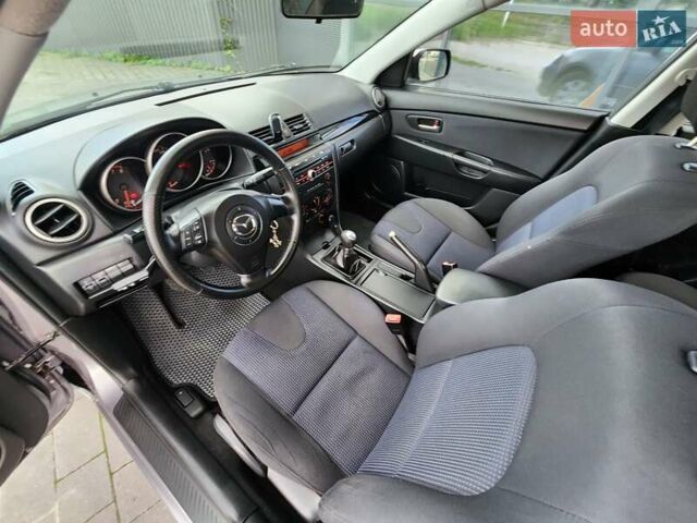 Серый Мазда 3, объемом двигателя 1.6 л и пробегом 175 тыс. км за 4950 $, фото 46 на Automoto.ua