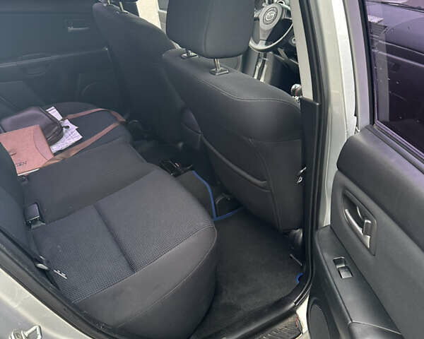 Серый Мазда 3, объемом двигателя 1.6 л и пробегом 127 тыс. км за 4900 $, фото 11 на Automoto.ua