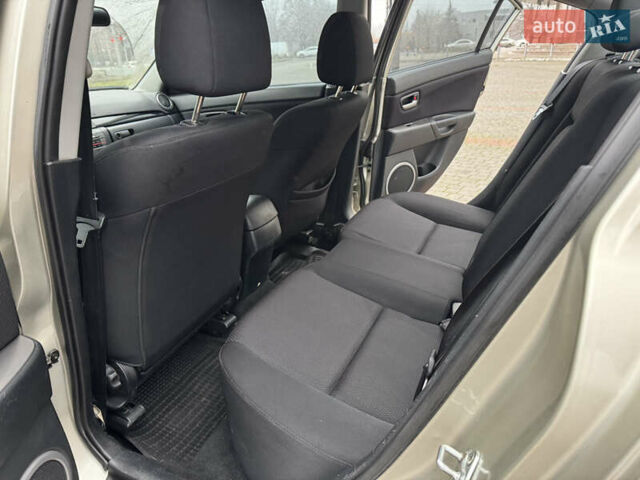 Серый Мазда 3, объемом двигателя 1.6 л и пробегом 165 тыс. км за 5000 $, фото 11 на Automoto.ua