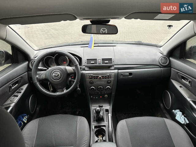 Серый Мазда 3, объемом двигателя 1.6 л и пробегом 310 тыс. км за 4400 $, фото 10 на Automoto.ua