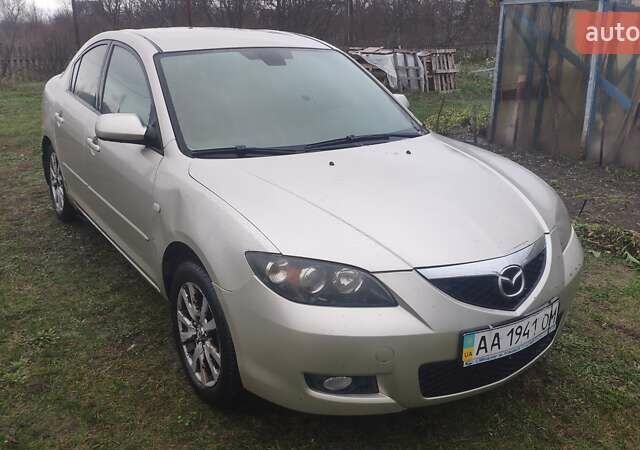 Серый Мазда 3, объемом двигателя 1.6 л и пробегом 241 тыс. км за 3300 $, фото 2 на Automoto.ua