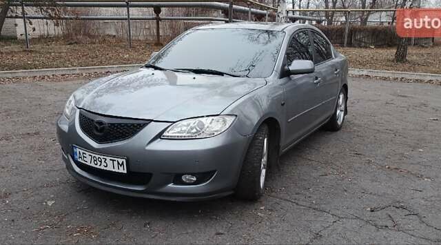 Серый Мазда 3, объемом двигателя 1.6 л и пробегом 301 тыс. км за 5400 $, фото 3 на Automoto.ua