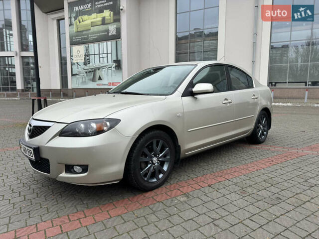 Серый Мазда 3, объемом двигателя 1.6 л и пробегом 165 тыс. км за 5000 $, фото 1 на Automoto.ua