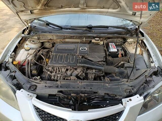 Серый Мазда 3, объемом двигателя 1.6 л и пробегом 383 тыс. км за 3400 $, фото 2 на Automoto.ua