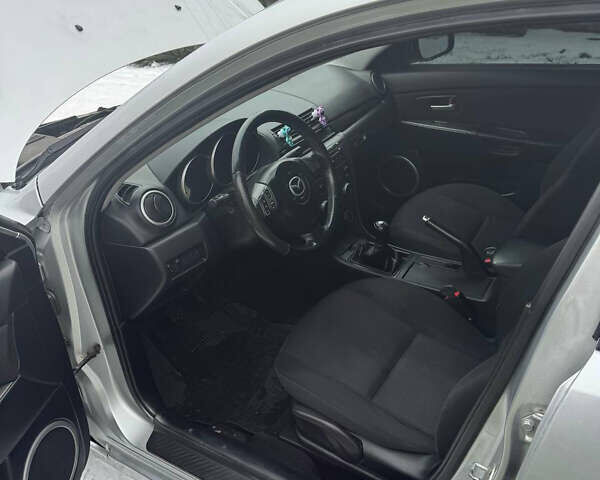 Сірий Мазда 3, об'ємом двигуна 1.6 л та пробігом 251 тис. км за 4100 $, фото 6 на Automoto.ua