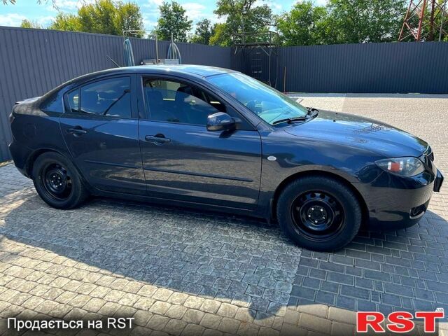 Серый Мазда 3, объемом двигателя 1.6 л и пробегом 203 тыс. км за 4500 $, фото 1 на Automoto.ua