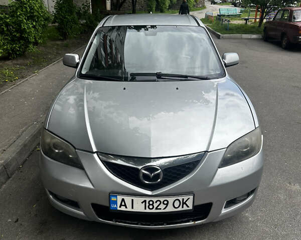 Сірий Мазда 3, об'ємом двигуна 1.6 л та пробігом 244 тис. км за 3990 $, фото 1 на Automoto.ua