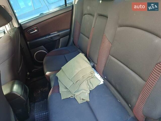 Серый Мазда 3, объемом двигателя 2 л и пробегом 200 тыс. км за 3500 $, фото 5 на Automoto.ua