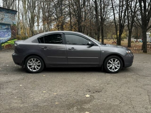 Серый Мазда 3, объемом двигателя 1.6 л и пробегом 190 тыс. км за 5500 $, фото 4 на Automoto.ua