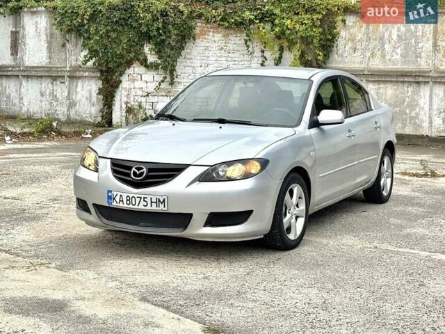 Серый Мазда 3, объемом двигателя 2 л и пробегом 214 тыс. км за 4450 $, фото 3 на Automoto.ua