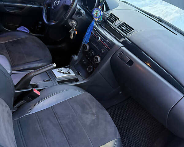 Серый Мазда 3, объемом двигателя 1.6 л и пробегом 279 тыс. км за 5000 $, фото 14 на Automoto.ua