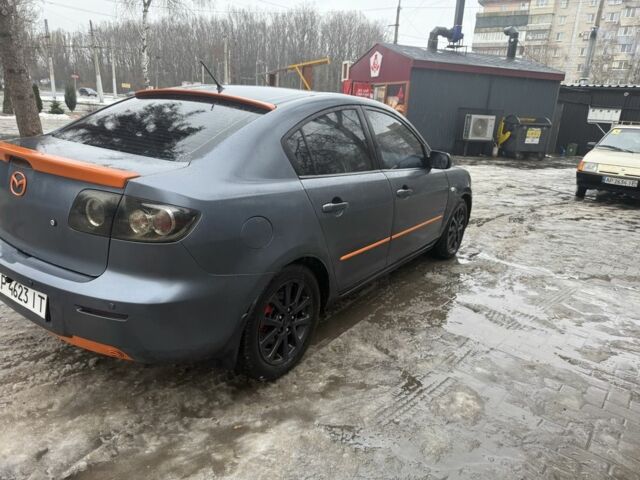 Серый Мазда 3, объемом двигателя 2 л и пробегом 230 тыс. км за 4800 $, фото 4 на Automoto.ua