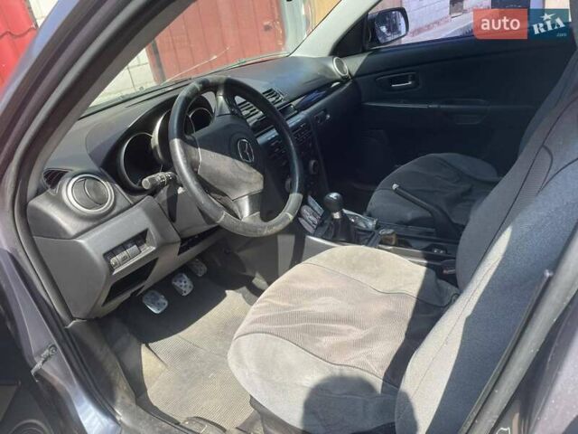 Серый Мазда 3, объемом двигателя 2 л и пробегом 139 тыс. км за 4500 $, фото 7 на Automoto.ua
