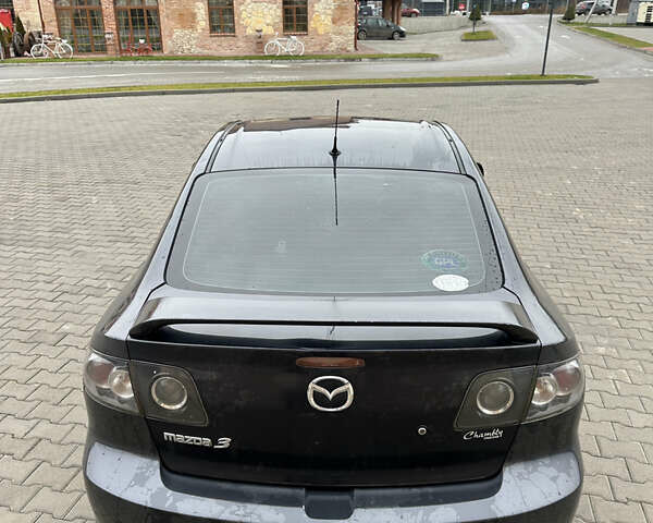 Серый Мазда 3, объемом двигателя 1.6 л и пробегом 310 тыс. км за 4400 $, фото 5 на Automoto.ua