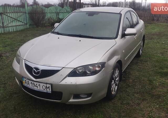 Серый Мазда 3, объемом двигателя 1.6 л и пробегом 241 тыс. км за 3300 $, фото 1 на Automoto.ua
