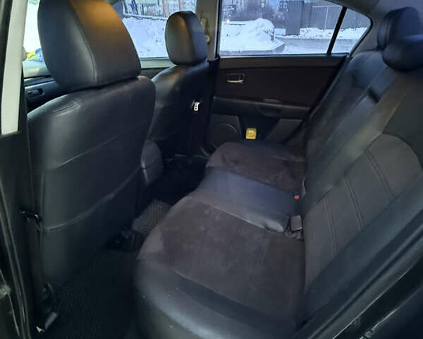 Серый Мазда 3, объемом двигателя 1.6 л и пробегом 279 тыс. км за 5000 $, фото 7 на Automoto.ua