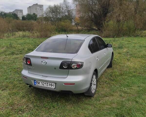Серый Мазда 3, объемом двигателя 1.6 л и пробегом 170 тыс. км за 5200 $, фото 6 на Automoto.ua