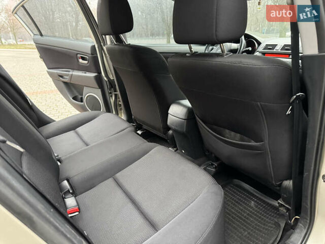 Серый Мазда 3, объемом двигателя 1.6 л и пробегом 165 тыс. км за 5000 $, фото 12 на Automoto.ua