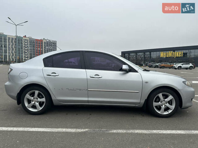 Серый Мазда 3, объемом двигателя 1.6 л и пробегом 127 тыс. км за 4900 $, фото 3 на Automoto.ua