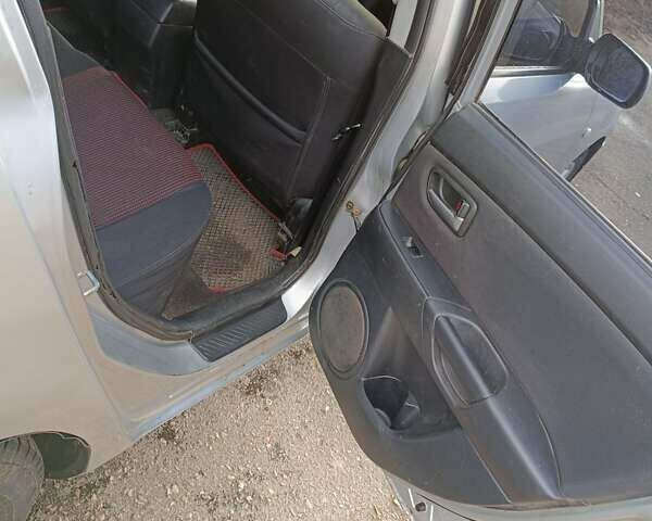 Серый Мазда 3, объемом двигателя 1.6 л и пробегом 383 тыс. км за 3400 $, фото 10 на Automoto.ua