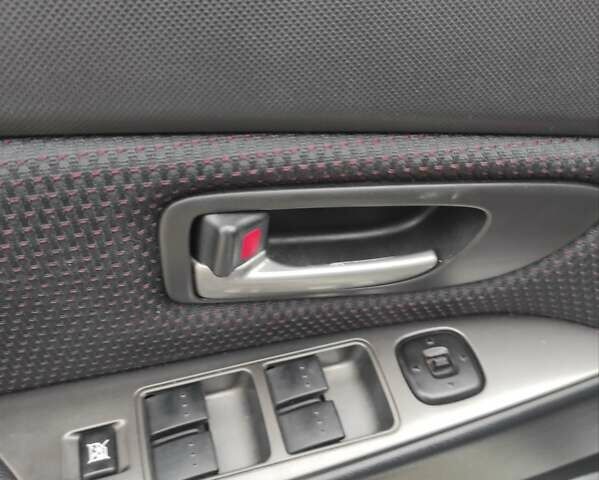 Серый Мазда 3, объемом двигателя 1.6 л и пробегом 170 тыс. км за 5200 $, фото 4 на Automoto.ua